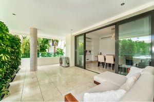 Spacious covered terrace with garden view in a premium Marbella property