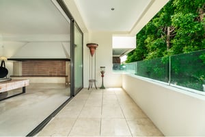 Luxury entrance lobby of Los Monteros Park with contemporary finishes and natural stone